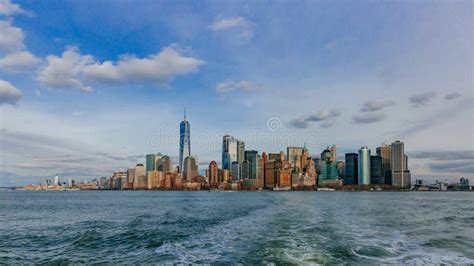 Buildings And Skyscrapers Of Downtown Manhattan Over Water In New York
