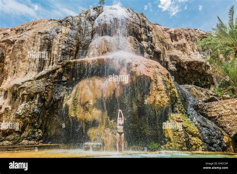 One Woman Bathing At Main Hot Springs Waterfall In Jordan Middle East