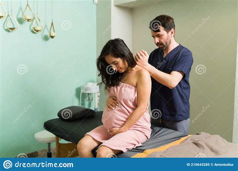 Beautiful Pregnant Woman Relaxing With A Shoulder Massage Stock Image Image Of Shoulder