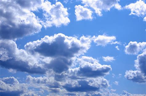 Puffy Clouds In Blue Sky 4k Ultra Hd Wallpaper