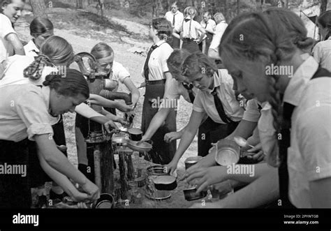 Girls In The Summer Camp Of The Bund Deutscher Maedel In Karlshagen Rinsing Their Dishes