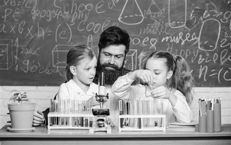 School Teacher Of Biology Man Bearded Teacher Work With Microscope And