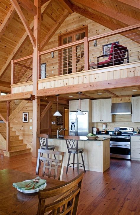 Overlooking the living room below, the upper level stair landing leads to. Pin on Barn loft ideas