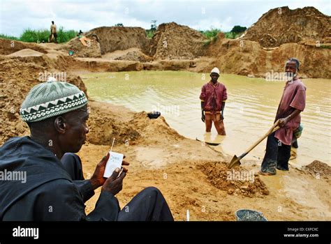 Man With Radio At Diamond Mines In Kono Sierra Leone Stock Photo Alamy