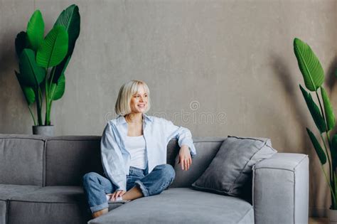 Happy Relaxed Young Woman Rest Lounge Lean On Couch Enjoy Peaceful Mood Healthy Lazy Calm Girl