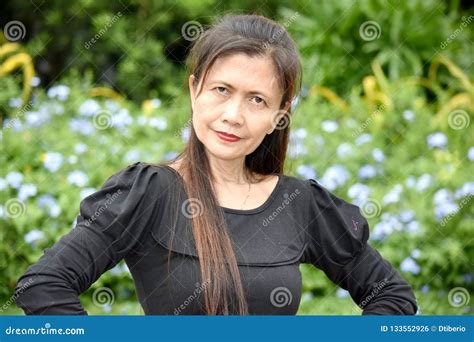 Serious Filipina Female Senior Stock Photo Image Of Older Female