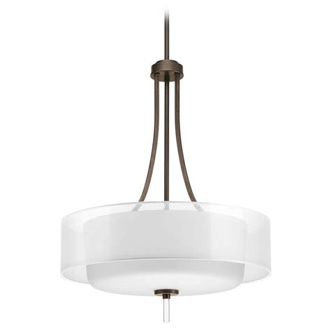 Crafted from steel, this design features a spun drum shade with a narrow top, a flared neck, and a wide body that gently tapers to direct light downward and out from a 100 w incandescent e26 medium base bulb (not. Drum Pendant Light with White Glass in Antique Bronze ...