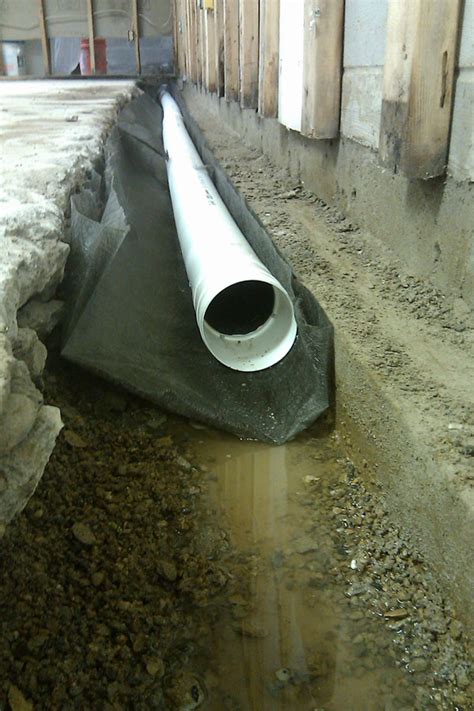 French drain companies in your area proper drainage is crucial to prevent foundation and basement problems and to remove standing water in yards after storms. Photo Gallery | StayDry Michigan