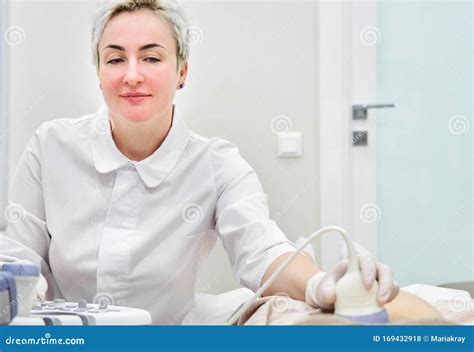 Gynecologist Doing Ultrasound Scan In Modern Clinic Stock Photo Image