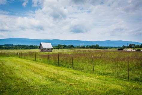 Fields And Small Shed With Mountains In The Distance In Elkton In The