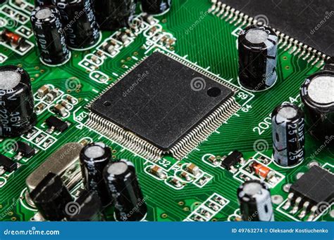 Electronic Circuit Board With Chip And Radio Components Stock Photo