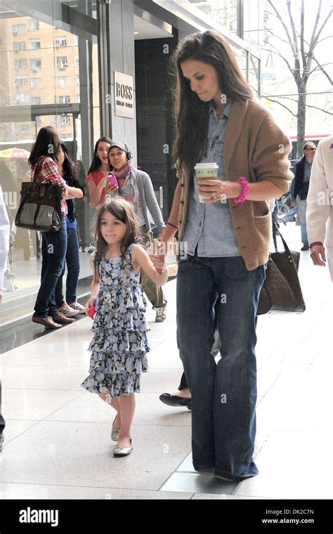 katie holmes and daughter suri cruise out and about in manhattan featuring katie holmes and