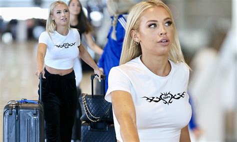 Tammy Hembrow Goes Braless In A White T Shirt As She Rolls Her Designer