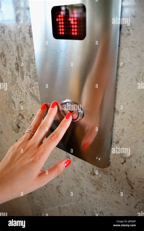 Female Hand Pressing Elevator Up Button Stock Photo Alamy