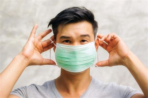 Should the blue side face out, or in? How to properly wear a face mask - Hong Kong Living