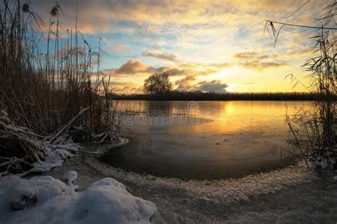Winter Landscape With Frozen River And Sunset Sky Stock Photo Image
