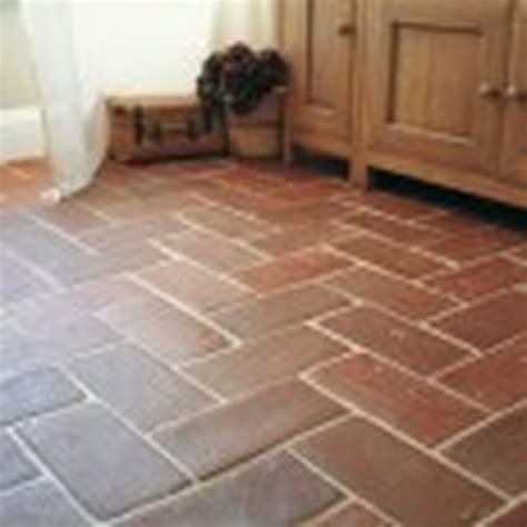 Terra cotta tiles work in a farmhouse kitchen, a ranch guest bathroom, and a shower stall. Tile Kitchen Floor with Natural Terracotta Tiles - Tiling ...