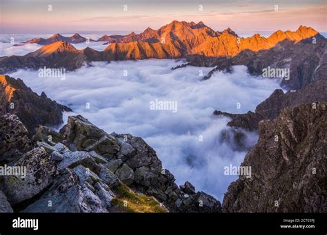 Mountains Landscape With Inversion In The Valley At Sunset As Seen From