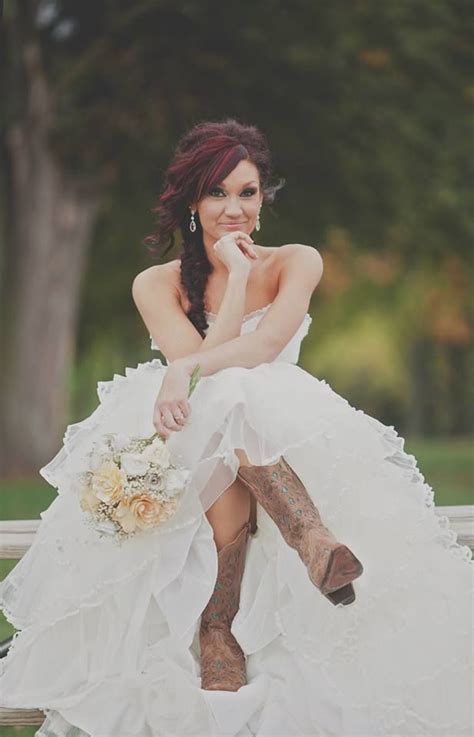 Fashion a weathered window into a seating chart display atop an antique dresser, repurpose old bottles as table numbers, or place jars of grandma's homemade jam atop place settings. wedding gowns with cowboy boots | Wedding dress with ...