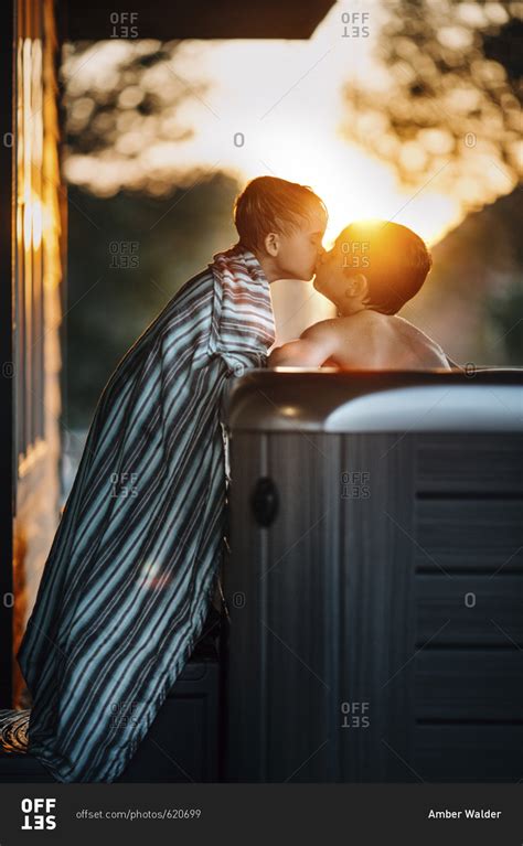 Brothers Kissing In Hot Tub Stock Photo Offset