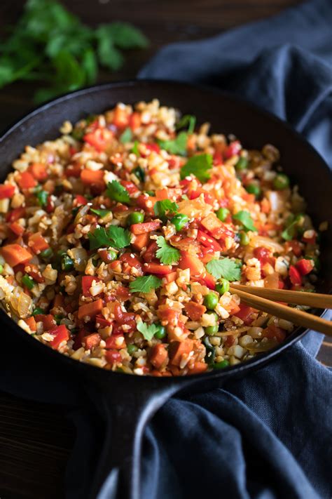 Cauliflower rice or riced cauliflower has been replacing tradtional rice in a lot of recipes over the last few years. Vegan Cauliflower Fried Rice - Peas And Crayons