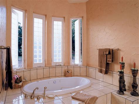 Glass block windows require minimal tools. Acrylic block casements over tub in bathroom. Bathroom ...