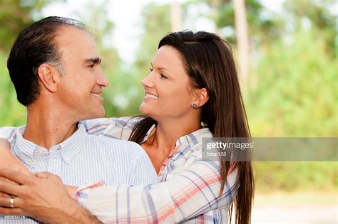 Mature Mixedrace Couple Outdoors In Summer High Res Stock Photo Getty