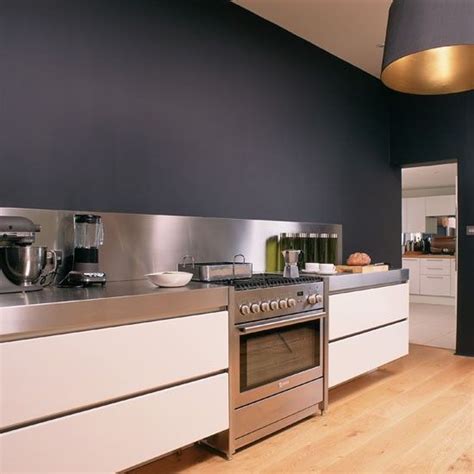 I suggest the light french gray because it has just the right amount of blue and gray to make a statement the framed painting complements the blue/gray wall color perfectly and adds a nice kitchen details. Kitchen, Grey White Kitchen Design With Dark Grey Painted ...
