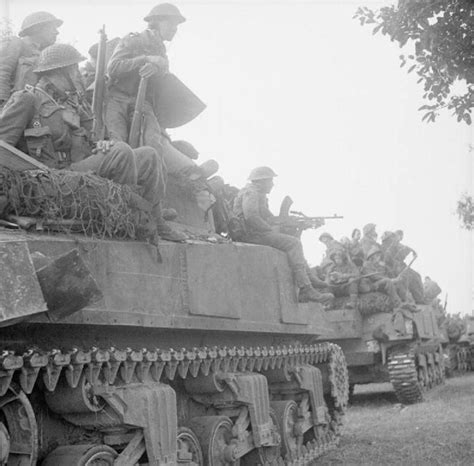 Sherman Tanks Carry Infantry Forward For The Start Of Operation