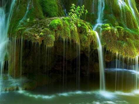Waterfall In Romania River Rock With Green Moss Flowing Water Lake