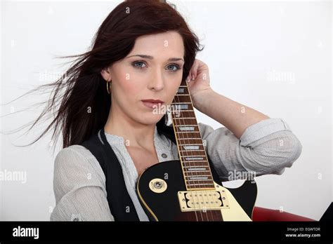 Woman Playing Guitar Stock Photo Alamy