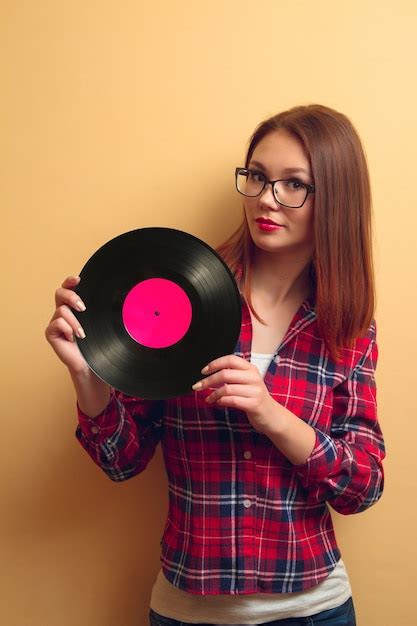 Premium Photo Girl Holding A Vinyl Record