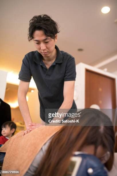 Son Massage Mom Photos And Premium High Res Pictures Getty Images