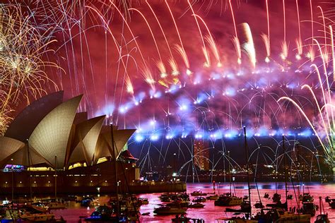 Fireworks Explode Over The Sydney Harbour Bridge And The Sydney Opera