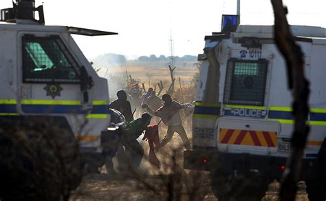 South African Police Open Fire On Striking Miners In Pictures World