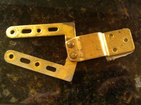 Medicine cabinet mirror hinges are very popular among interior decor enthusiasts as they allow for an added aesthetic appeal to the overall vibe of a property. Can anyone identify this HINGE from a Medicine Cabinet Tri ...