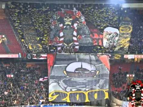 (weather, pitch condition, missing players. ajax hooligans krijgen klappen in eingen stadion - YouTube