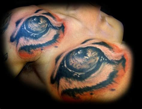 Colored Eye Tattoo On Man Right Shoulder