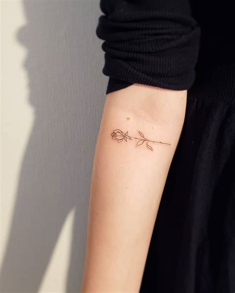 Tiny Rose On Forearm Tattoo By Jamie