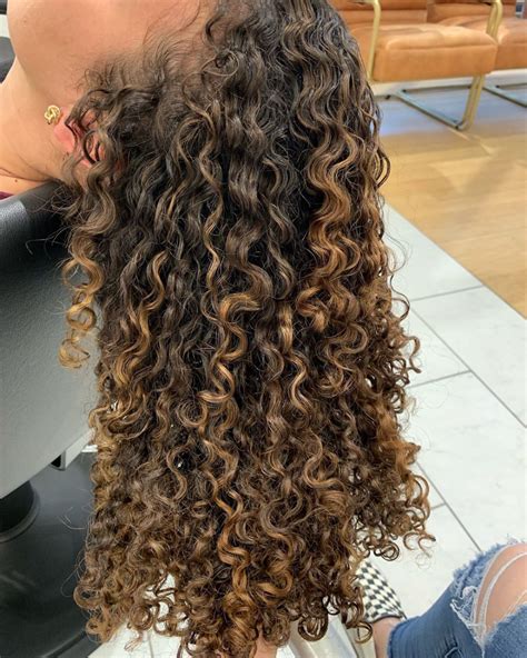 golden highlights on naturally curly hair highlights curly hair dark curly hair dyed curly hair
