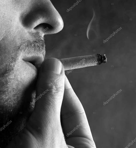 Smoking Cigarette Stock Photo By ©friday 6181369