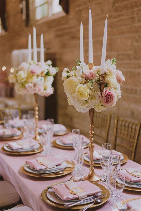 a soft and glamorous pink cream and gold table setting wedding theme gold pink pink and