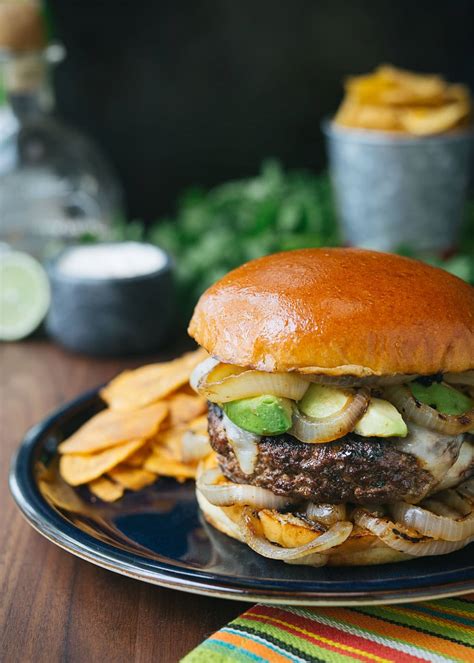 Firstly, beef patty is prepared by chopping and mixing together minced beef, onion, chilies, spices, lemon juice, sesame seeds, egg, bread crumbs. Gourmet Burger Recipe: Mojo Beef Burgers with Tequila-Lime ...