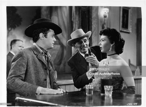 Tony Curtis Meets Colleen Miller At A Bar In A Scene From The Film