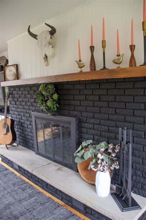 Prepping the stone fireplace for painting is probably the most important part. Our Black Painted Fireplace - Bright Green Door
