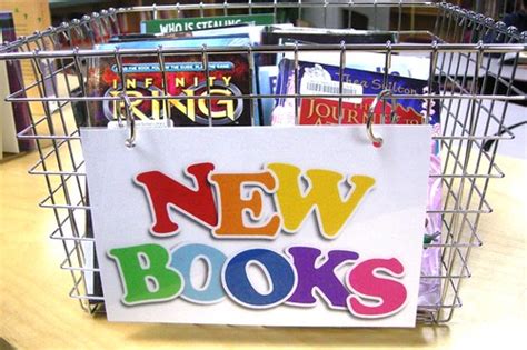 Basket Of New Books Basket Of New Books With A New Sign P Flickr