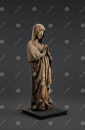 A Gothic Sculpture Depicting A Figure In Contrapposto Our Lady Of