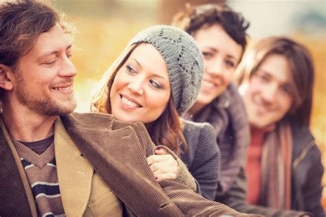 Group Of Friends Having Fun At The Park In Autumn Stock Photo By ©info