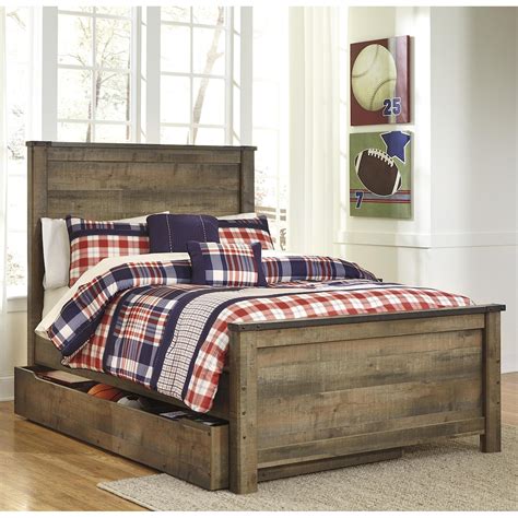 signature design by ashley trinell b446b9 rustic look full panel bed with under bed storage