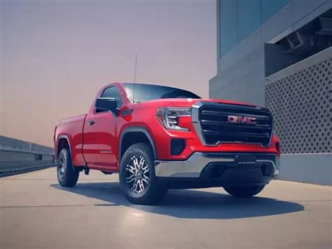 Comparison Between Gmc Sierra 2022 Regular Cab At4 And Toyota Land